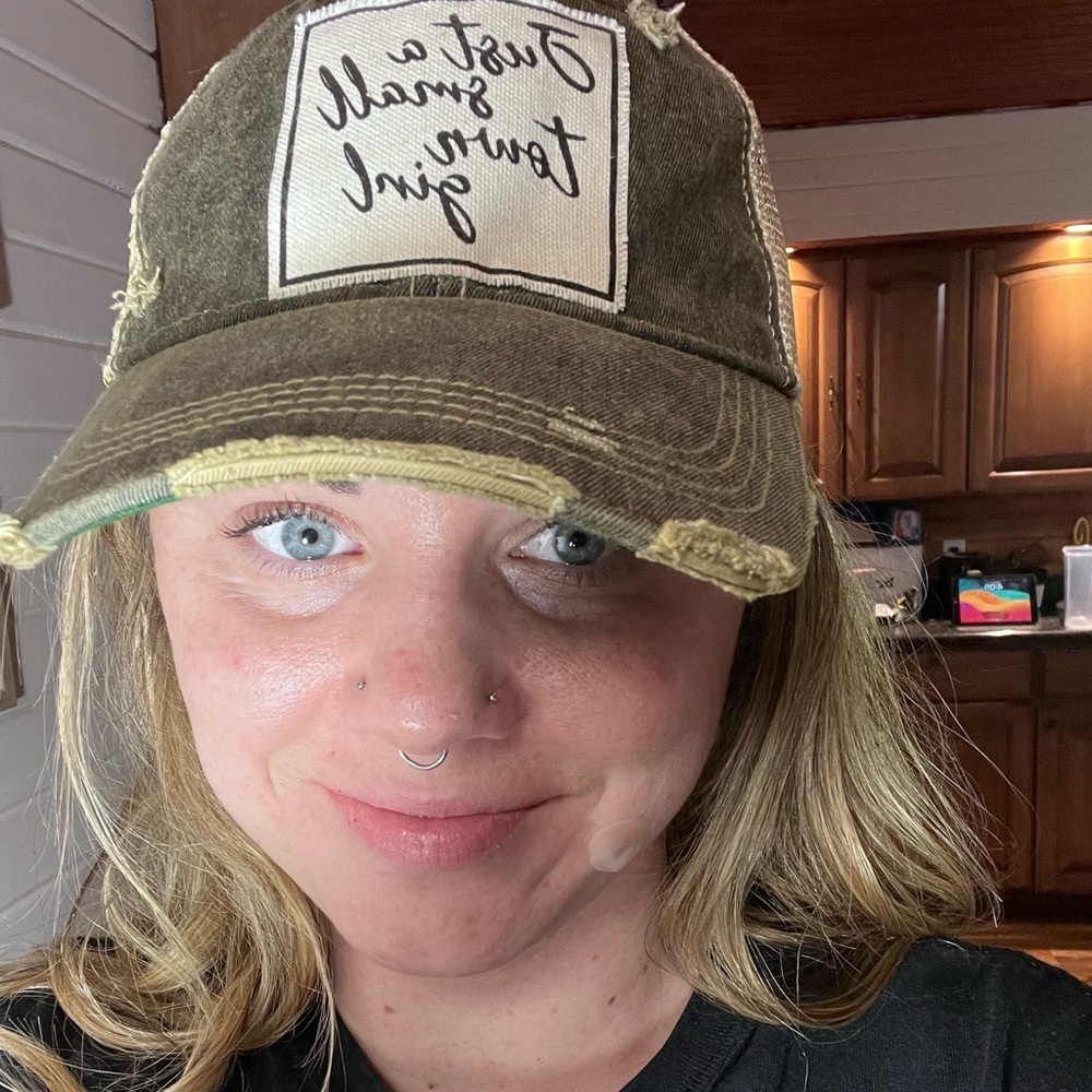 Woman’s ball cap.